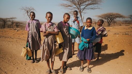 Picture of children walking miles in Kenya for water