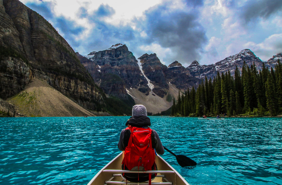 Picture of a girl in a canoe on a lake