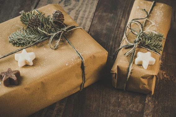 Picture of pretty Christmas presents wrapped up in brown paper and string