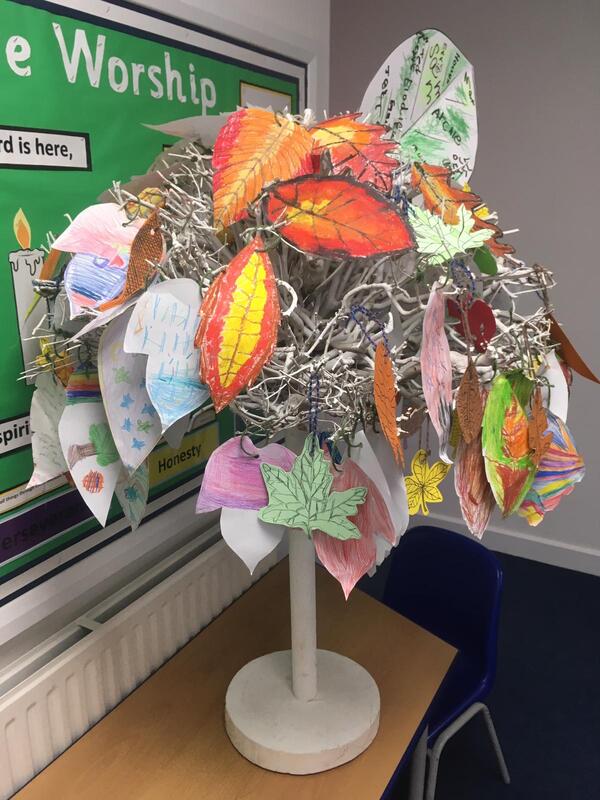 Picture of a tree made from wire and multicoloured leaves